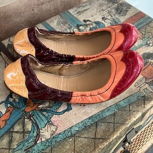 Miu Miu red pink and nude patent leather ballet slippers.